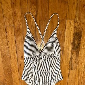 Size medium white/black striped one piece never worn
